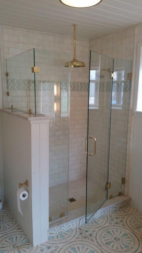 Glass Installation — A Shower enclosures With Gold Shower Hanging In The Sailing in San Antonio, TX