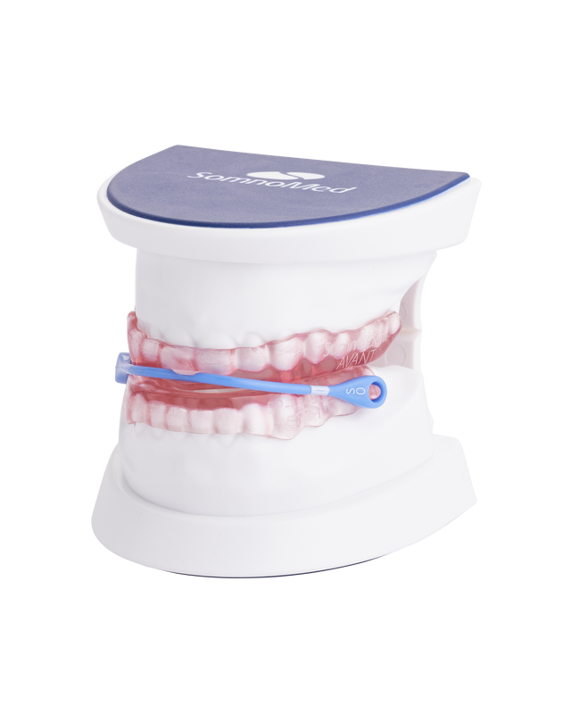 Dental appliance model with a blue band, on white display. Dental appliance model with a blue band, on white display.