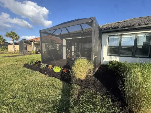 Screened lanai extension with concrete paver surface