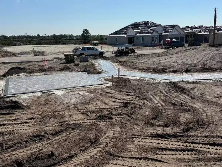 Paver walkway installation in new construction residential development in Florida