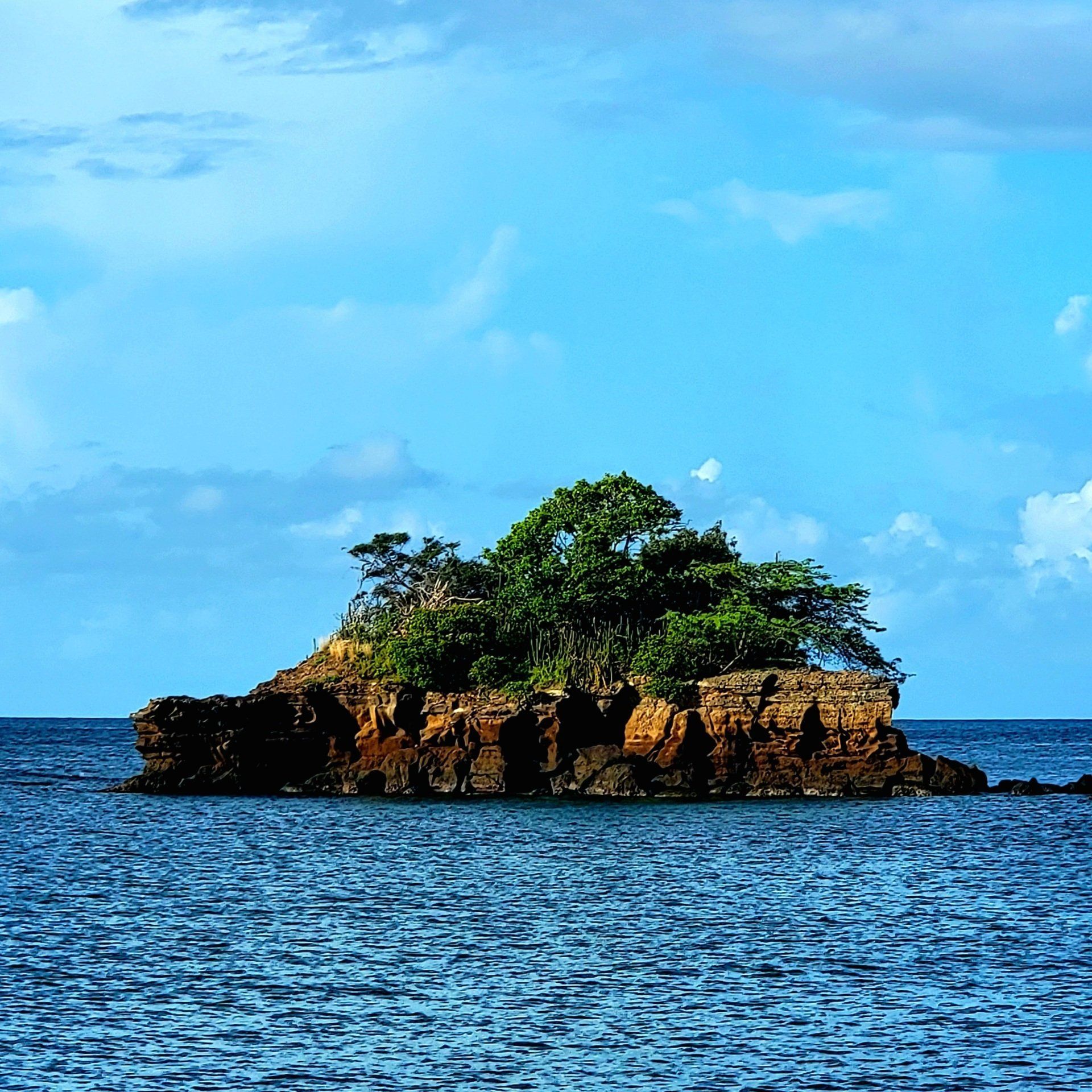 Photo by Phoenix Drone Pros, Robert Biggs, A small island in the middle of the ocean