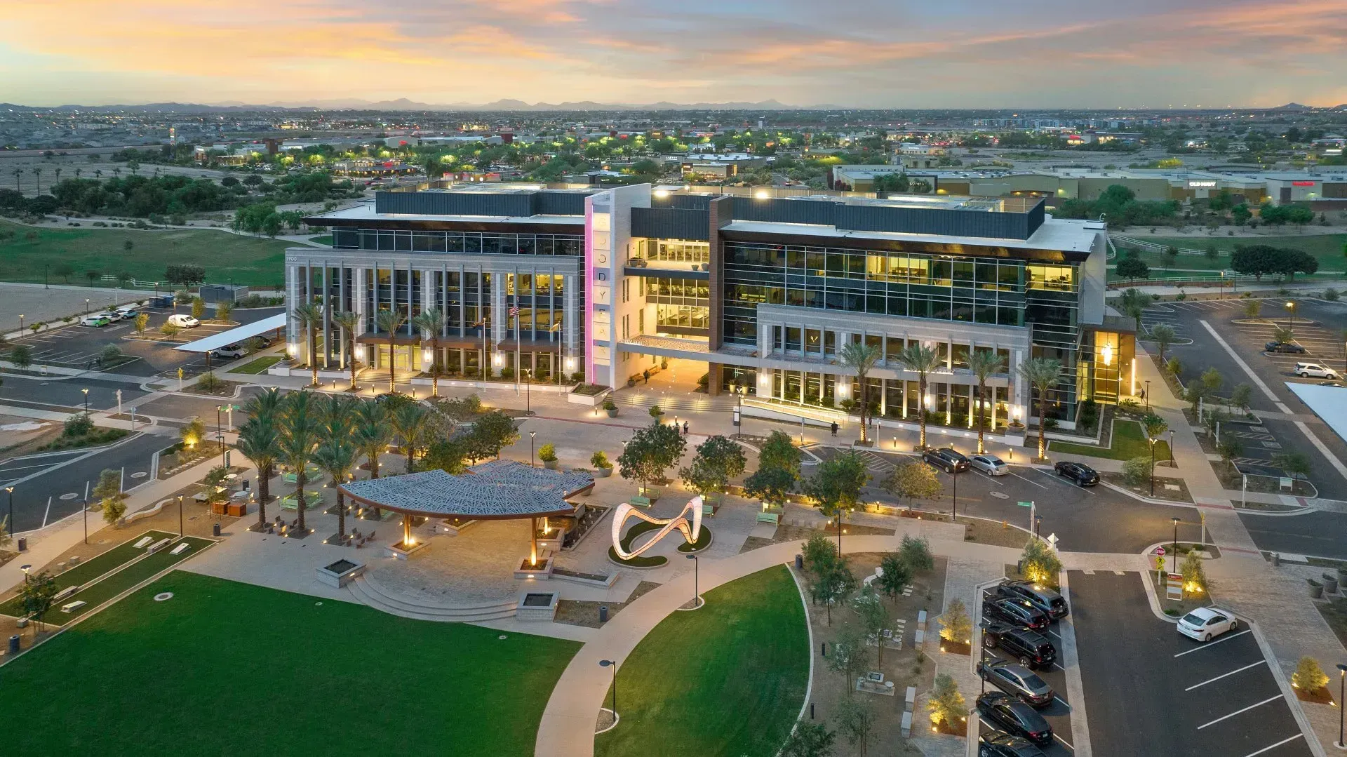 An aerial view of a large building in the middle of a city. Photo by Phoenix Drone Pros, Robert Biggs,