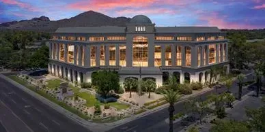 Photo by Phoenix Drone Pros, Robert Biggs, An aerial view of a large building with a mountain in the background.