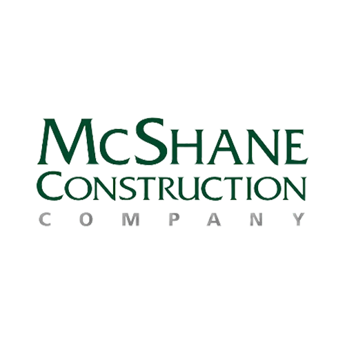 The logo for mcshane construction company is green and white.
