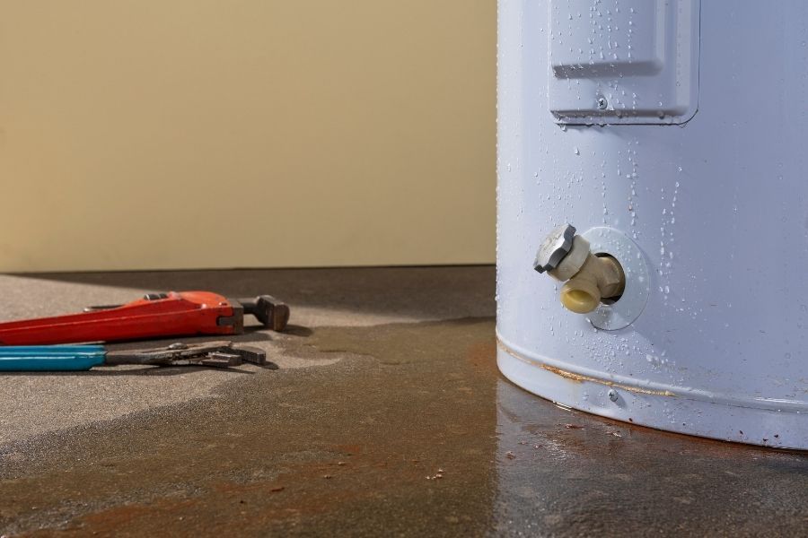 Active water heater leak causing flooding in a home