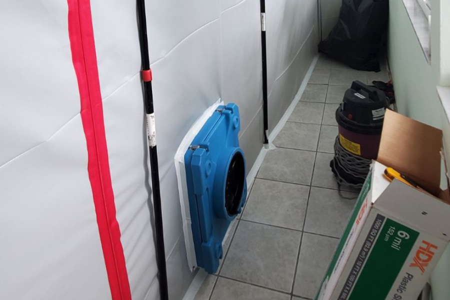 Professional containment and air scrubbing equipment for water damage