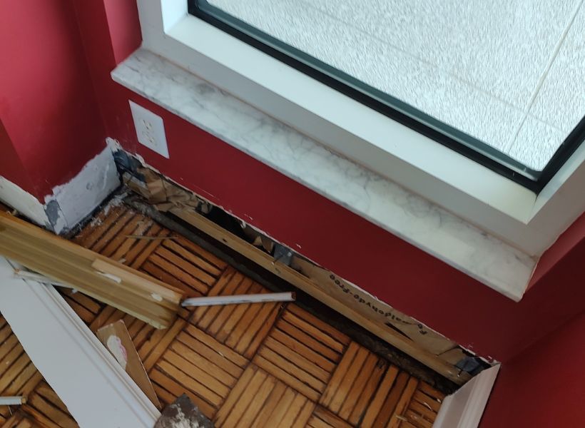 damage to the baseboards, drywall, and insulation