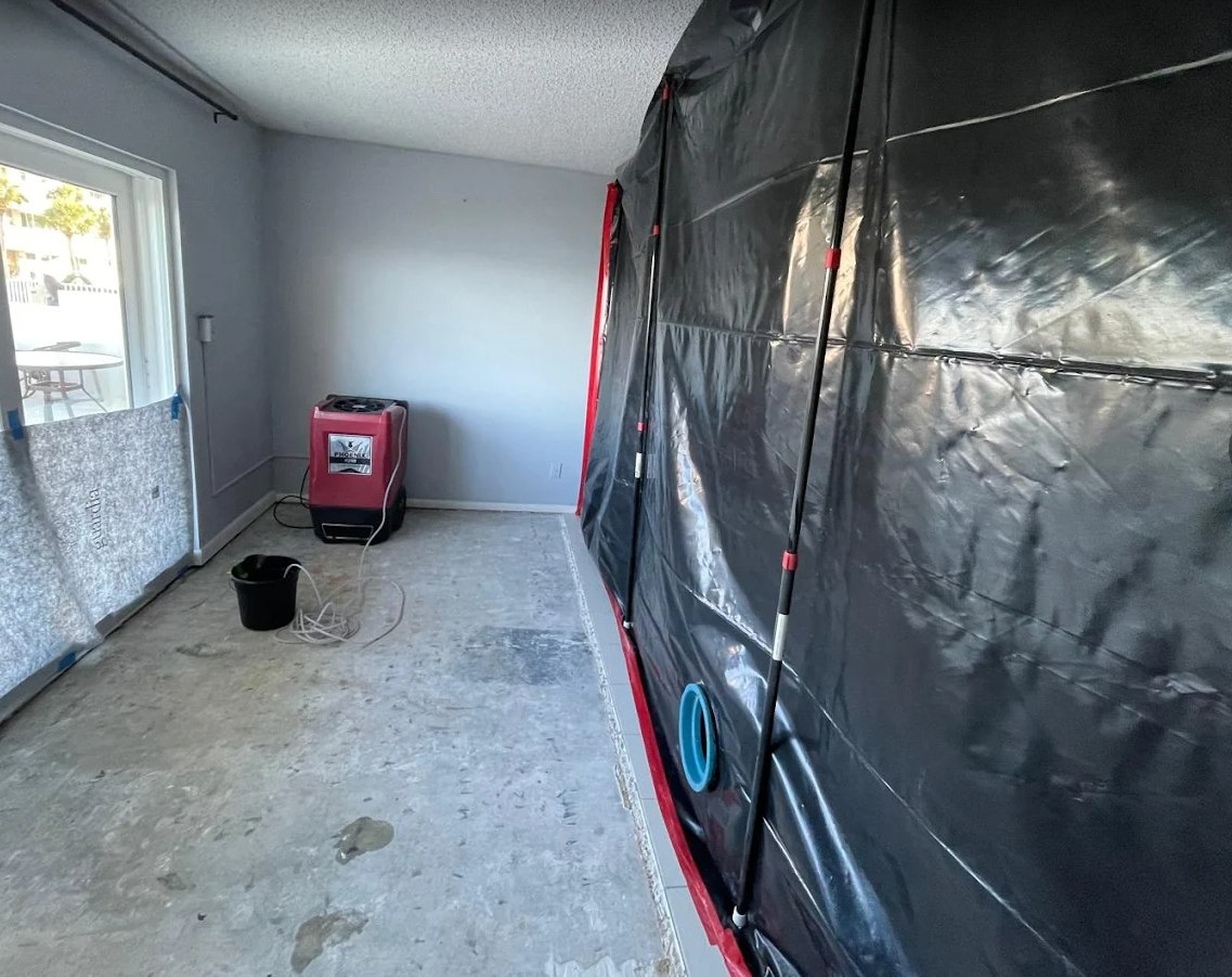 Drying fans and dehumidification equipment in containment area