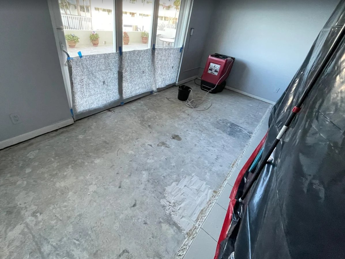 Moisture monitoring and drying process for concrete floor