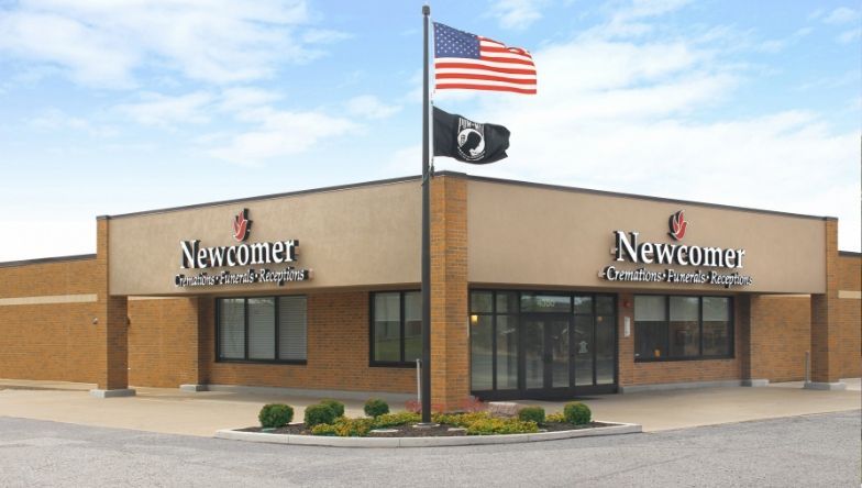 A building with the word newcomer on it