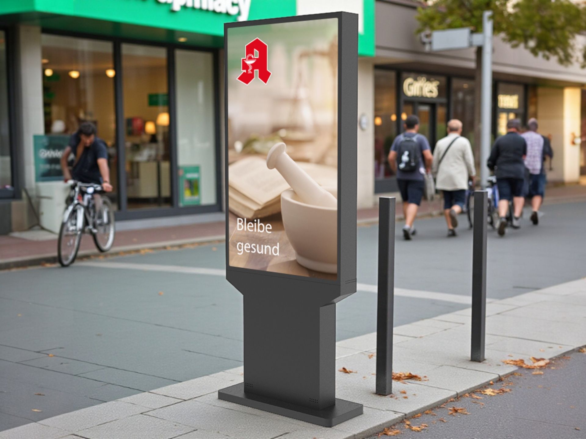 Außenwerbung für eine Apotheke mit Mörser und Stößel. Straßenszene mit Fußgängern, Radfahrer und Gebäude.