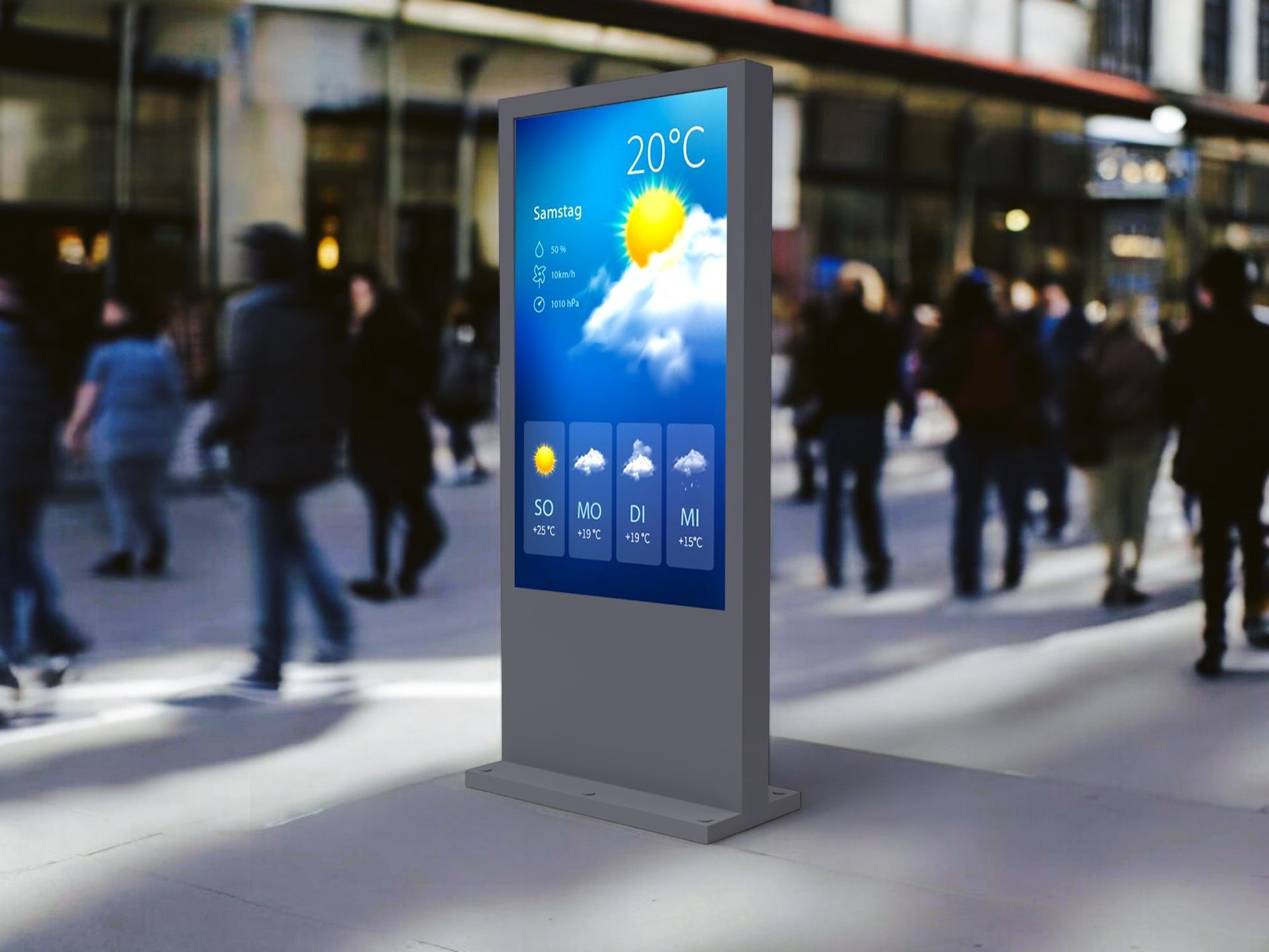 Digitale Wetteranzeige auf einem Bürgersteig in der Stadt, die sonniges Wetter bei einer Temperatur von 20°C anzeigt.