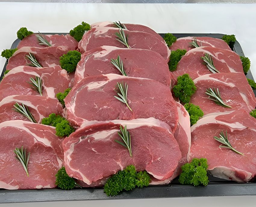 A Tray of Raw Steaks with Rosemary and Parsley on Top — Midway Butchers in South Innisfail, QLD