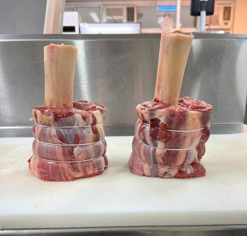 Two Pieces of Meat Stacked on Top of Each Other on a Cutting Board — Midway Butchers in South Innisfail, QLD