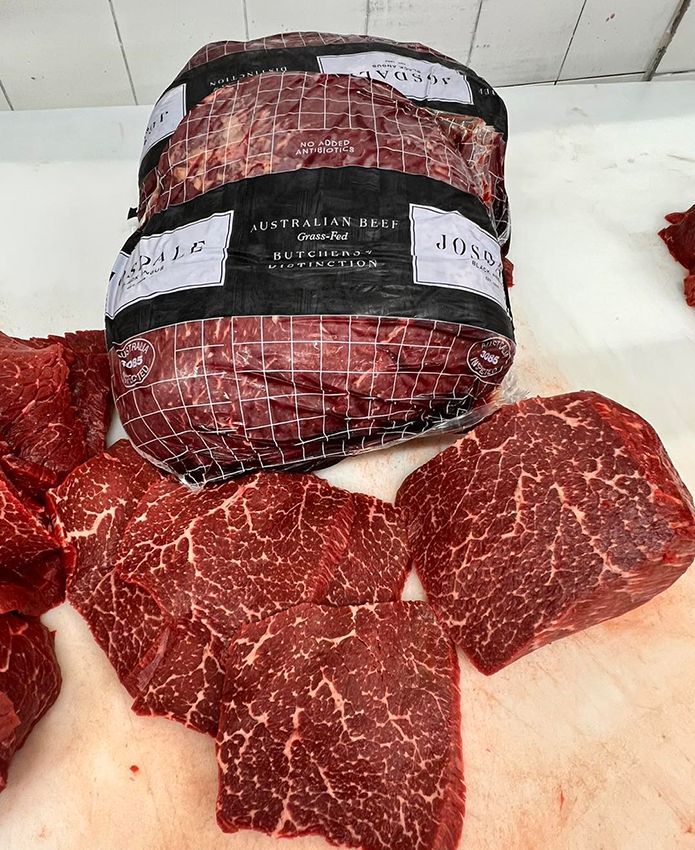 A Large Piece of Meat on Top of a Cutting Board — Midway Butchers in Mission Beach, QLD