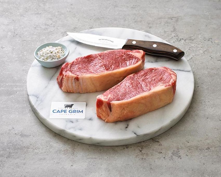 Two Pieces of Meat in a Plate with Knife — Midway Butchers in South Innisfail, QLD