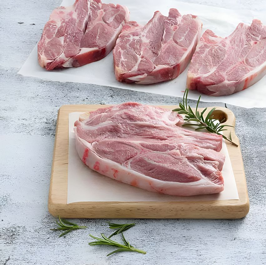 Three Pieces of Raw Meat on a Wooden Cutting Board — Midway Butchers in South Innisfail, QLD