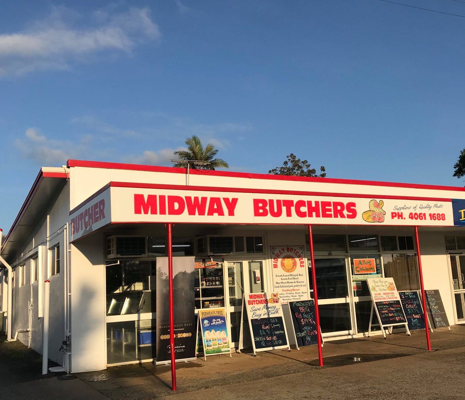 the front of a store with big red letter signs  — Midway Butchers in South Innisfail, QLD