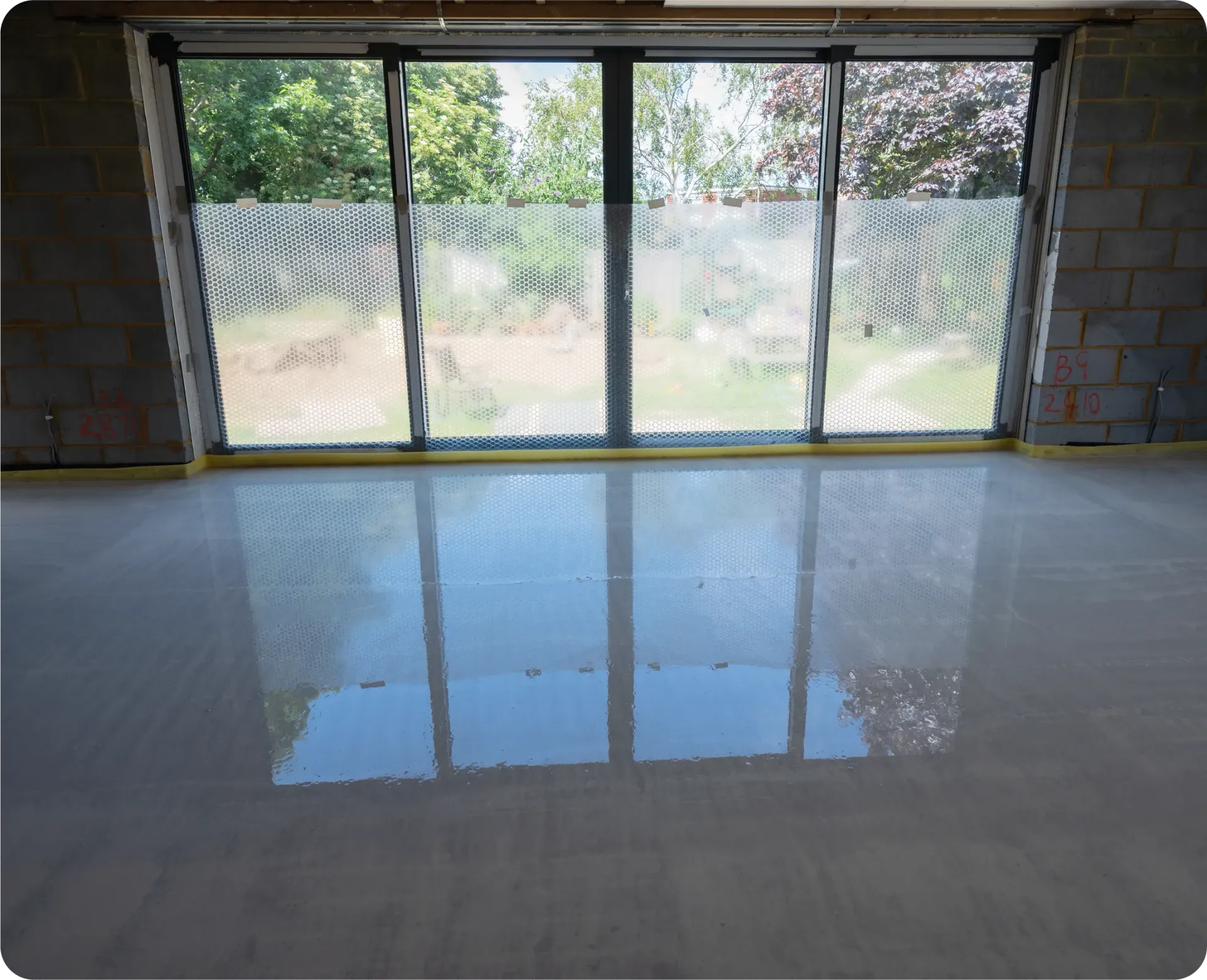 A picture of a house with a blue roof