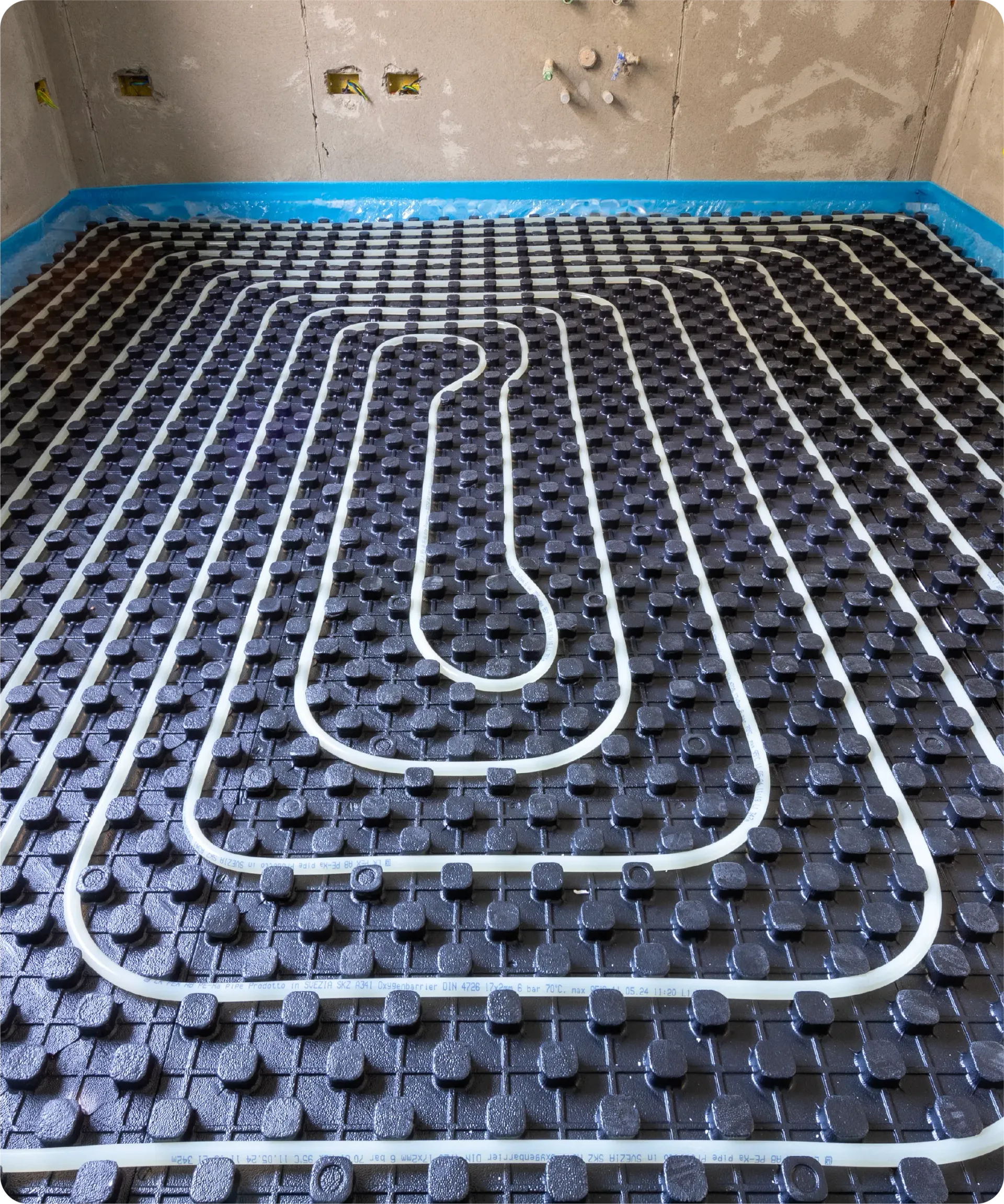 A picture of a house with a blue roof