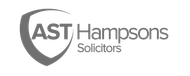 The logo for ast hampsons solicitors has a shield on it.