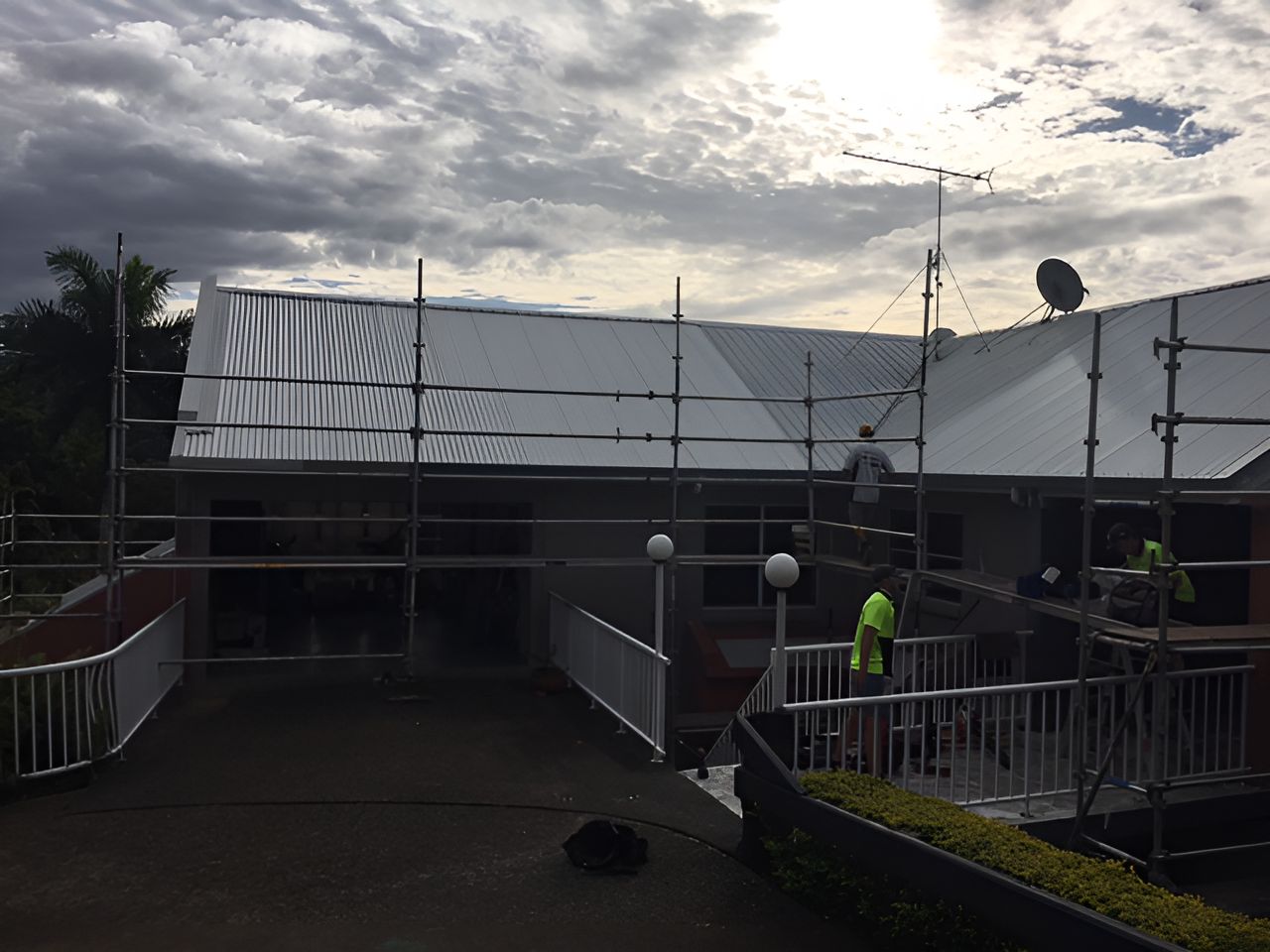A Building Under Construction With Scaffolding on the Roof — Roofing Revamped In Coolum Beach, QLD