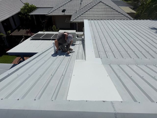 A Building Under Construction With a View of the Trees in the Background — Roofing Revamped in Sippy Downs, QLD
