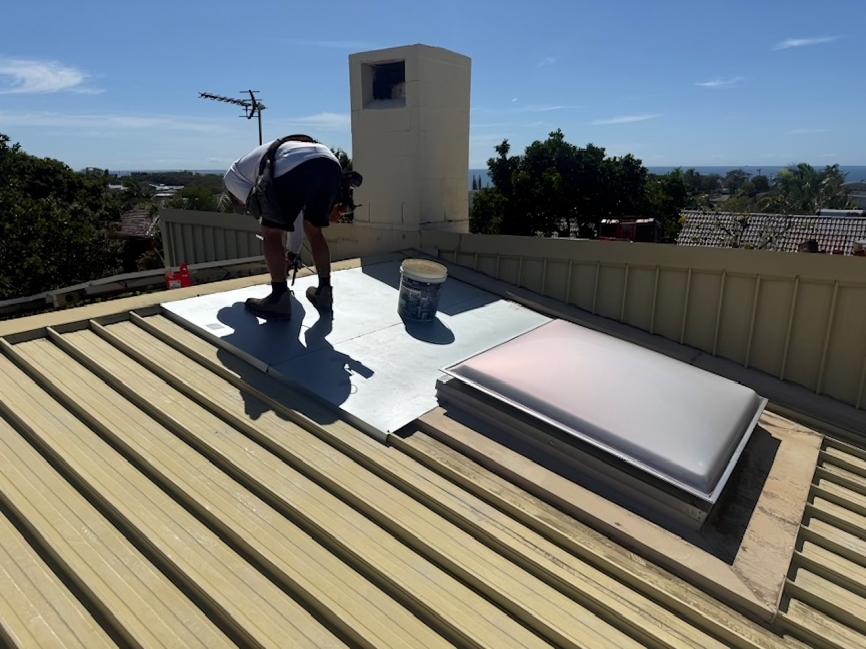Two Men Carrying a Roof Tile — Roofing Revamped in Maroochydore, QLD
