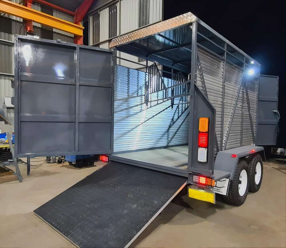 A Trailer With The Door Open Is Parked In A Garage — Eddies Trailers & Fab in Muswellbrook, NSW
