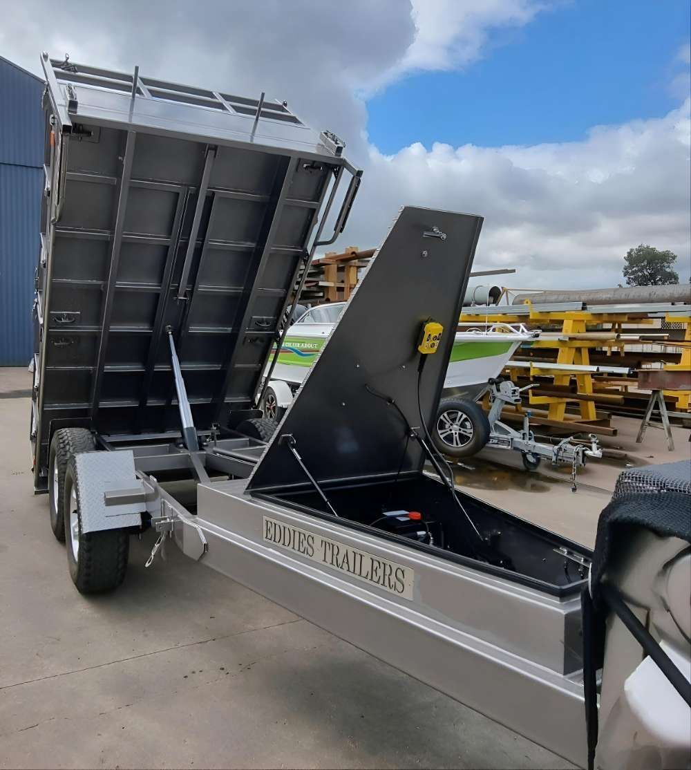 A Dump Trailer Is Parked On The Side Of The Road — Eddies Trailers & Fab in Muswellbrook, NSW