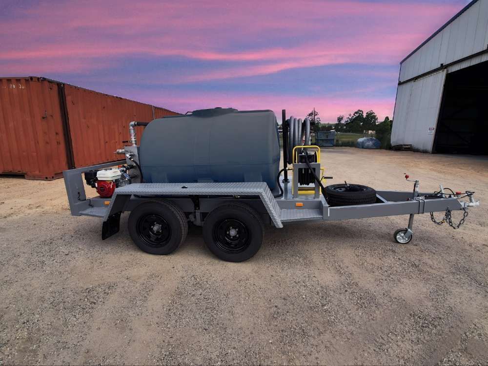 A Trailer With A Large Tank On It Is Parked In Front Of A Building — Eddies Trailers & Fab in Muswellbrook, NSW