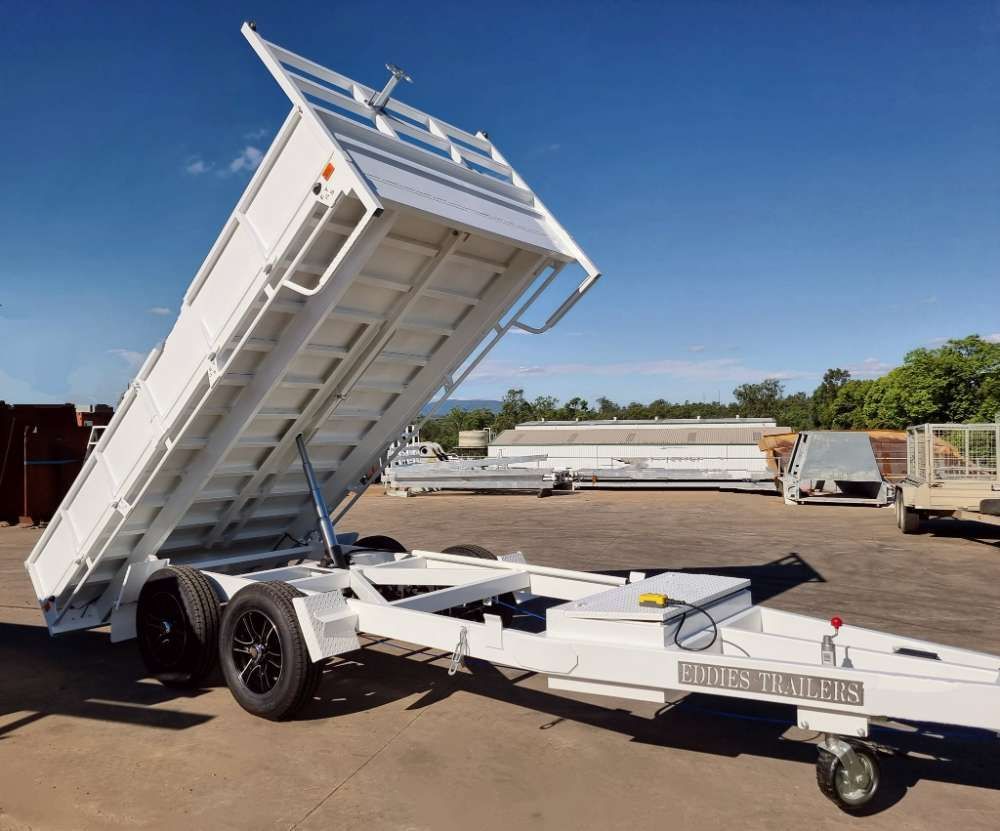 A White Dump Trailer Is Parked In A Parking Lot — Eddies Trailers & Fab in Muswellbrook, NSW