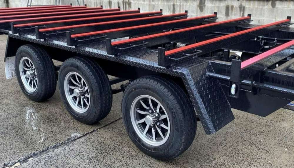 A Trailer With Three Wheels Is Parked On The Side Of The Road — Eddies Trailers & Fab in Muswellbrook, NSW