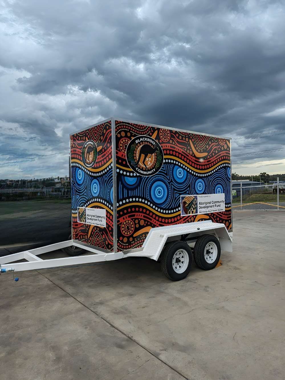 A Trailer With A Colourful Painting On It Is Parked In A Parking Lot — Eddies Trailers & Fab in Muswellbrook, NSW