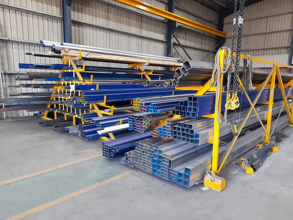 Stack Of Steel Poles — Eddies Trailers & Fab in Muswellbrook, NSW