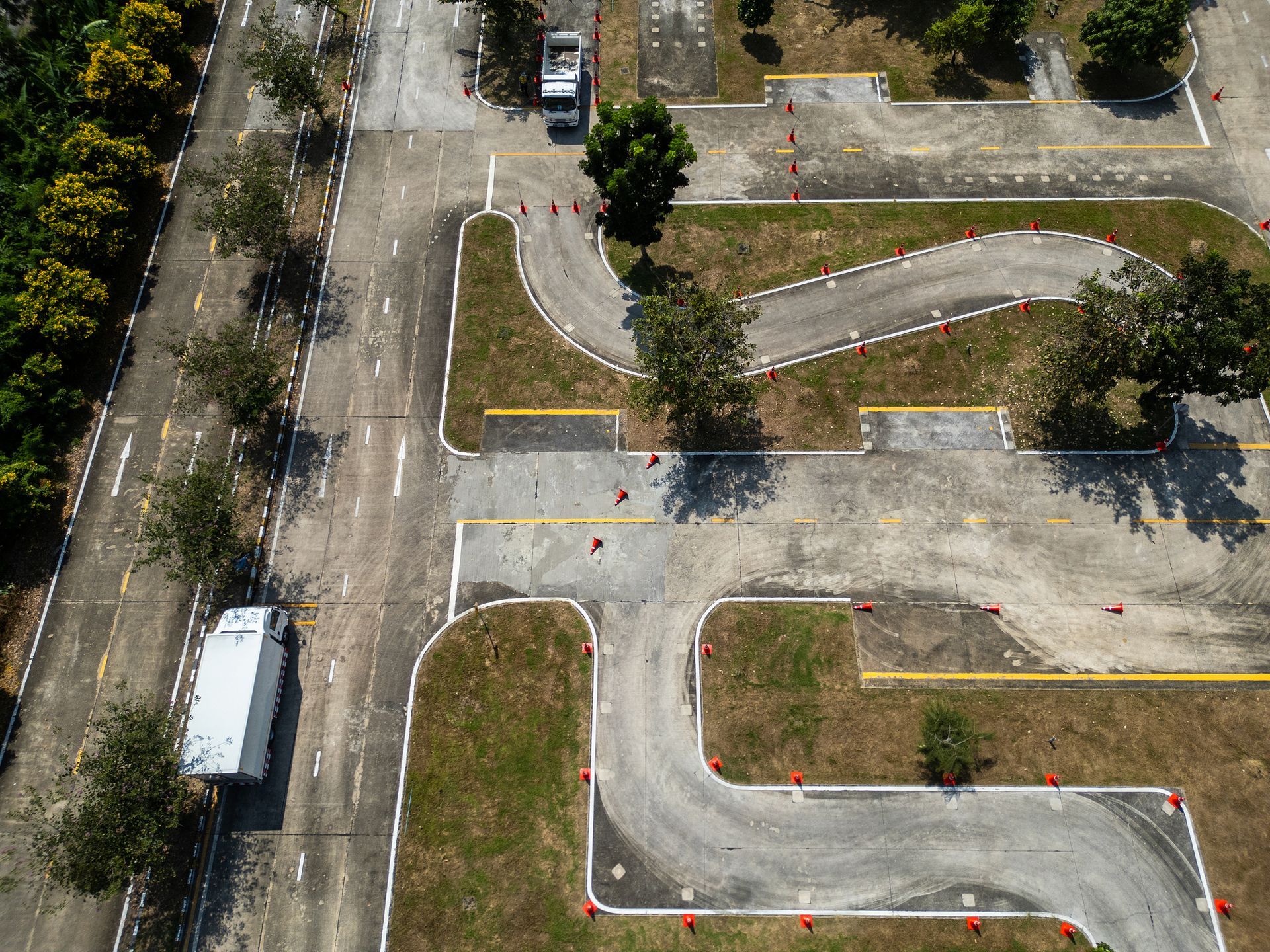Aerial photo of a truck driving practice course with marked lanes. Aerial photo of a truck driving practice course with marked lanes.