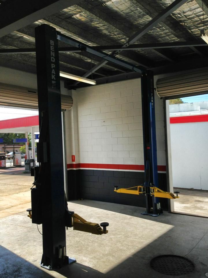 A Mazda Lift is Sitting in a Garage — Mr Shiny Mechanical in Andergrove, QLD