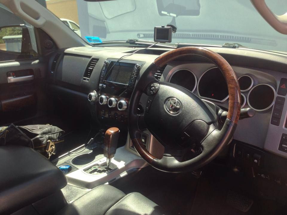 The Interior of a Toyota Tundra With a Wooden Steering Wheel — Mr Shiny Mechanical in Andergrove, QLD