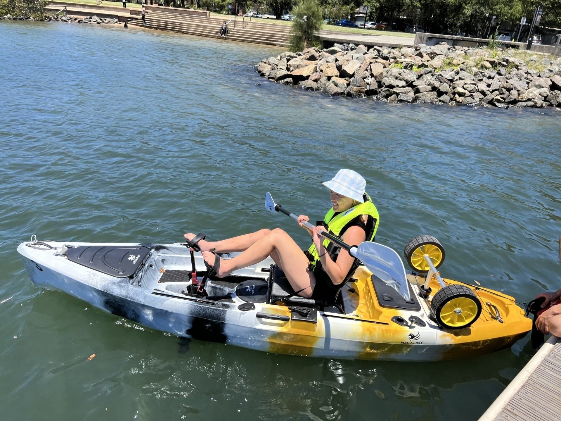 Orange HBR PNY kayak with impulse drive in action, ready for hire on Sydney Harbour