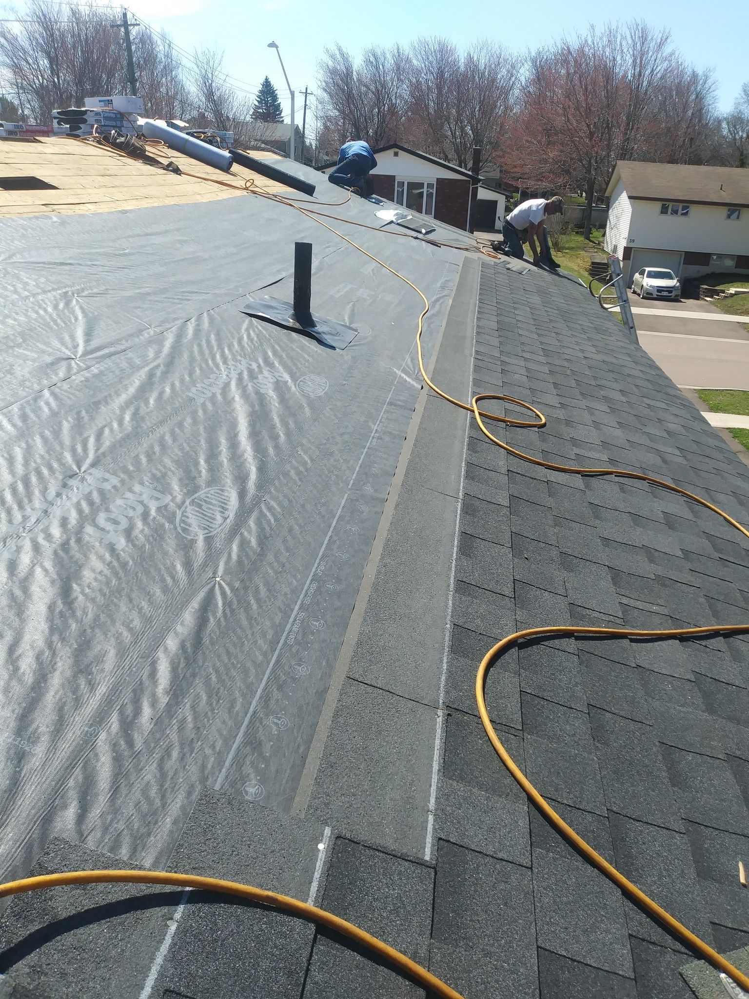 A roof with a hose attached to it.
