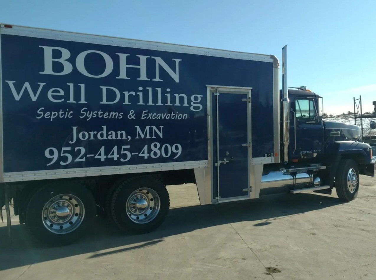A bohn well drilling truck is parked in jordan mn