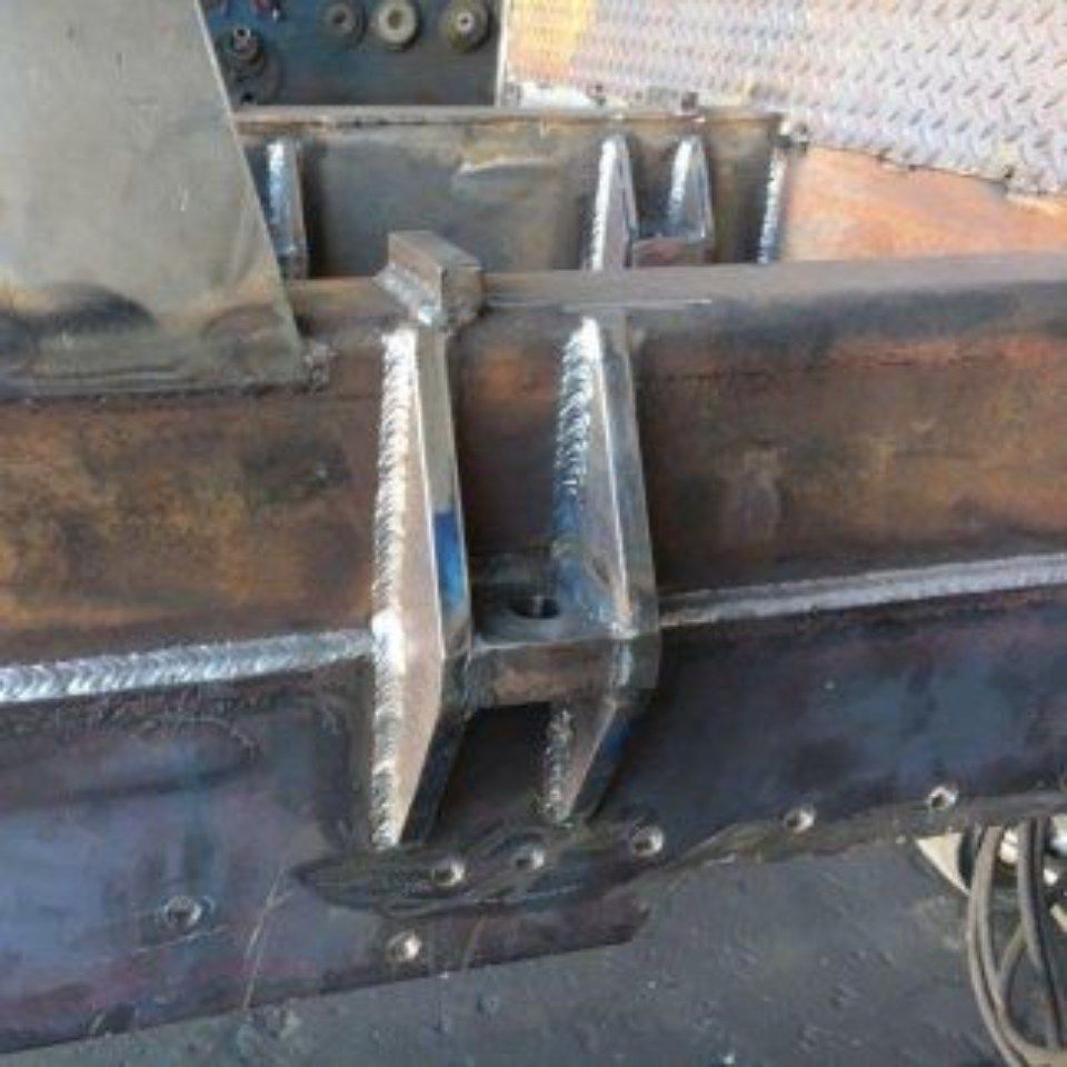 A close up of a piece of metal sitting on top of a table.