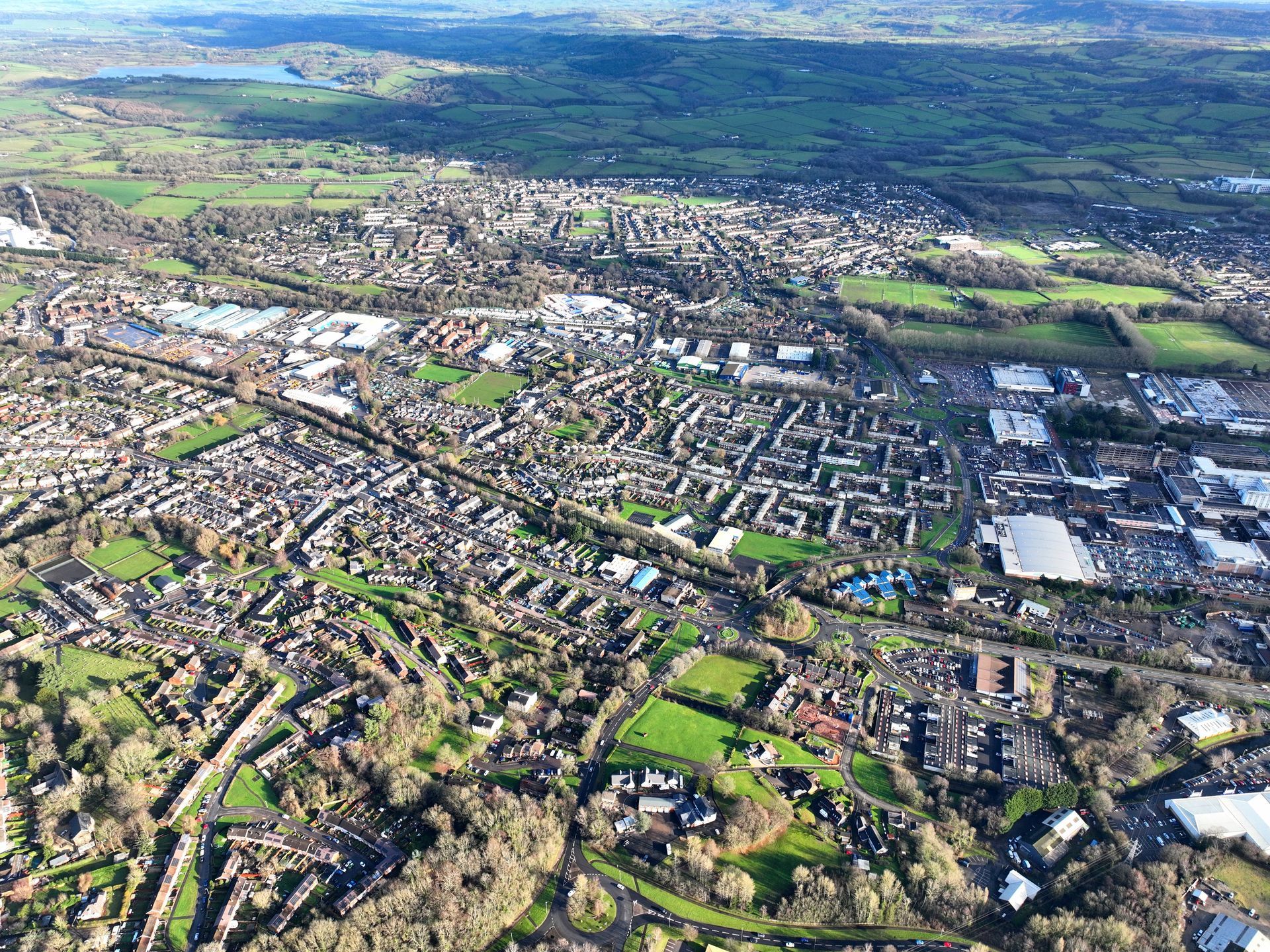 Aerial view of Cwmbran Town Centre, and surrounding private and commercial properties, Torfaen, Wales, United Kingdom.