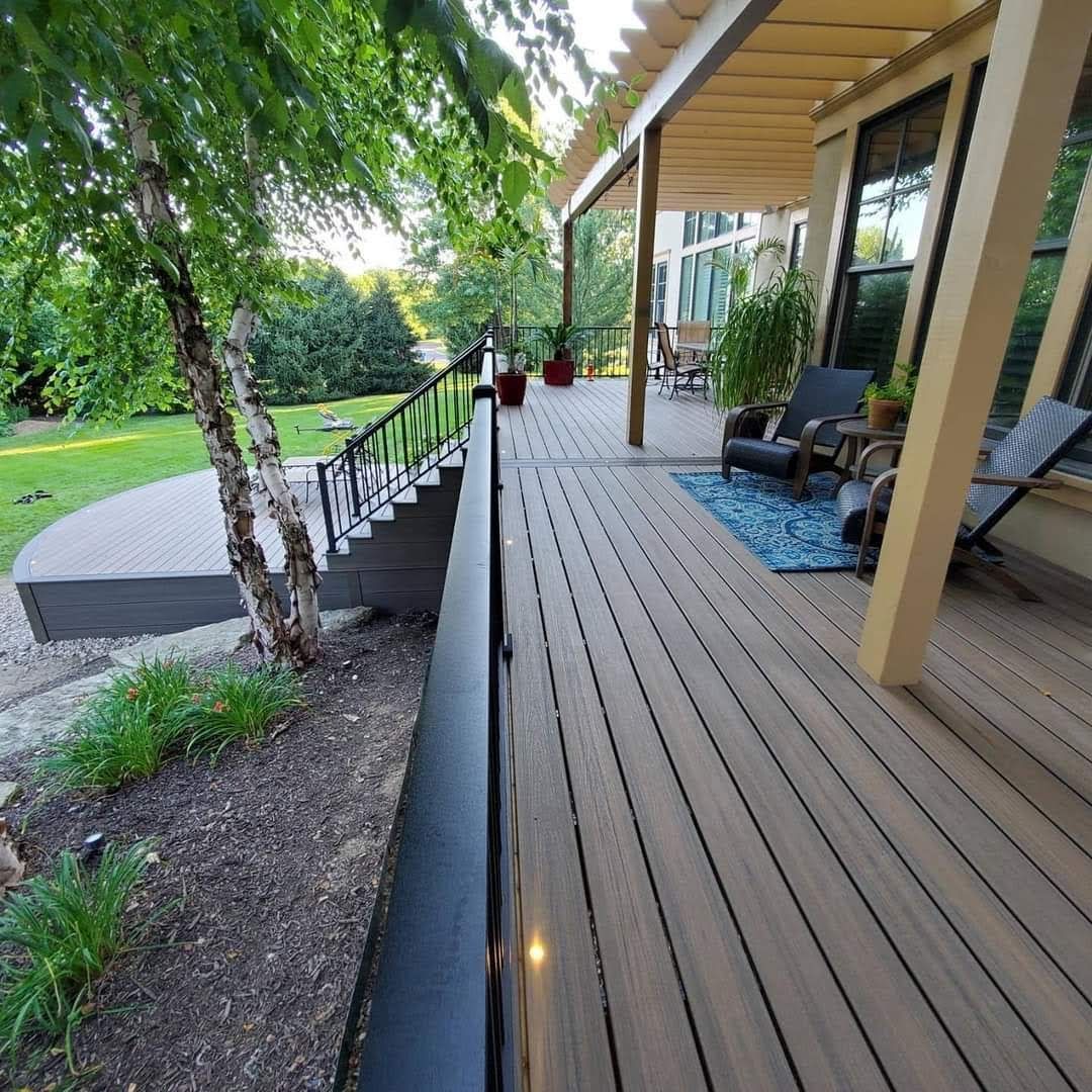 A wooden deck with stairs leading up to it