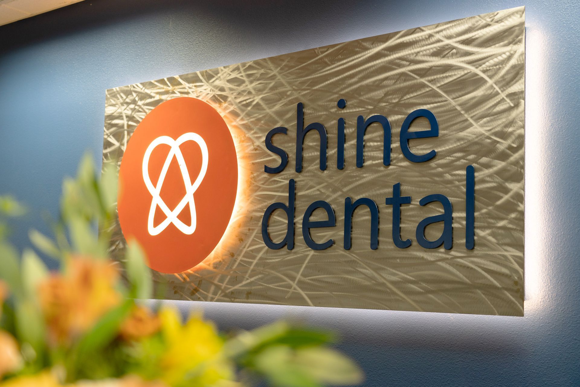 shine dental logo sign inside office