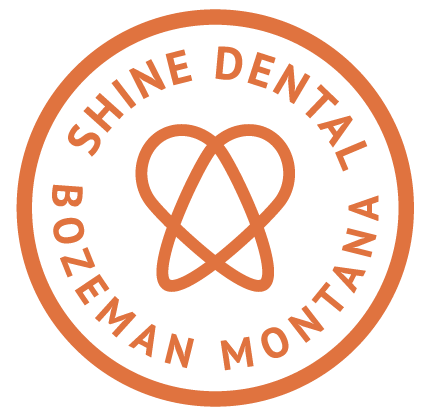 The logo for shine dental bozeman montana