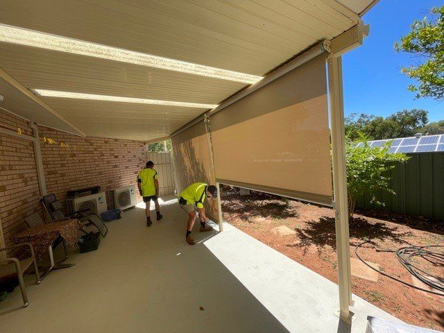 Workers Installing Awning — Blinds, Curtains And Shutters In Alice Springs, NT