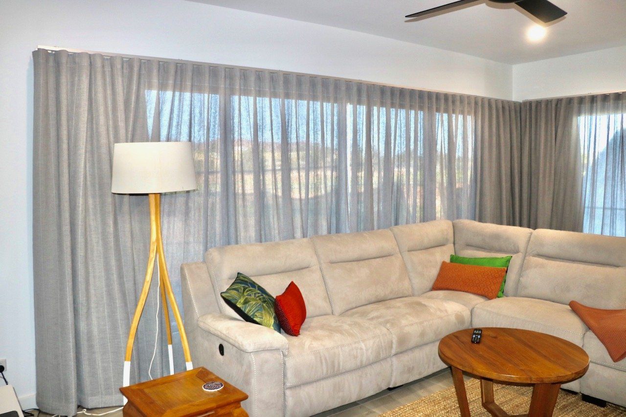 Internal Wavefold Curtains Behind A Couch — Blinds, Curtains And Shutters In Alice Springs, NT