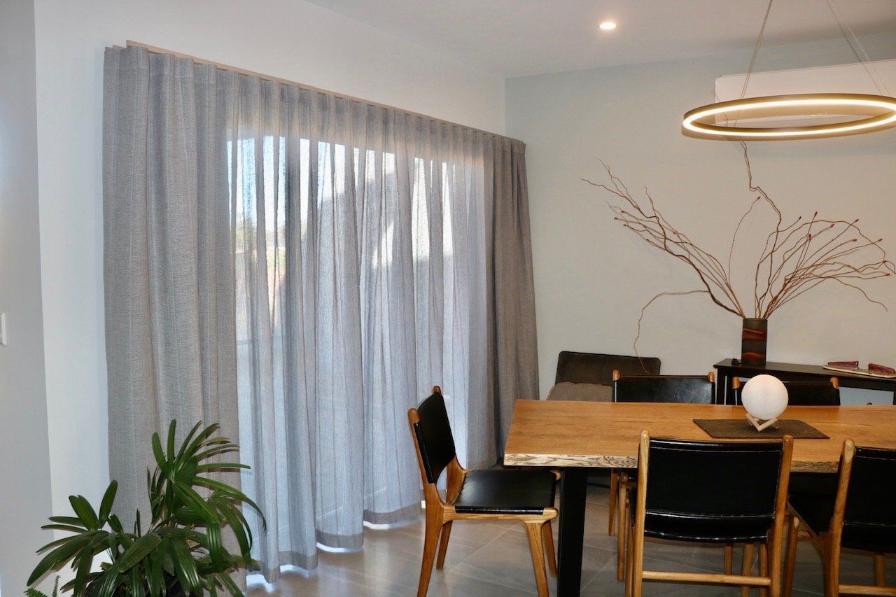 Wavefold Curtains In A Dining Room — Blinds, Curtains And Shutters In Alice Springs, NT