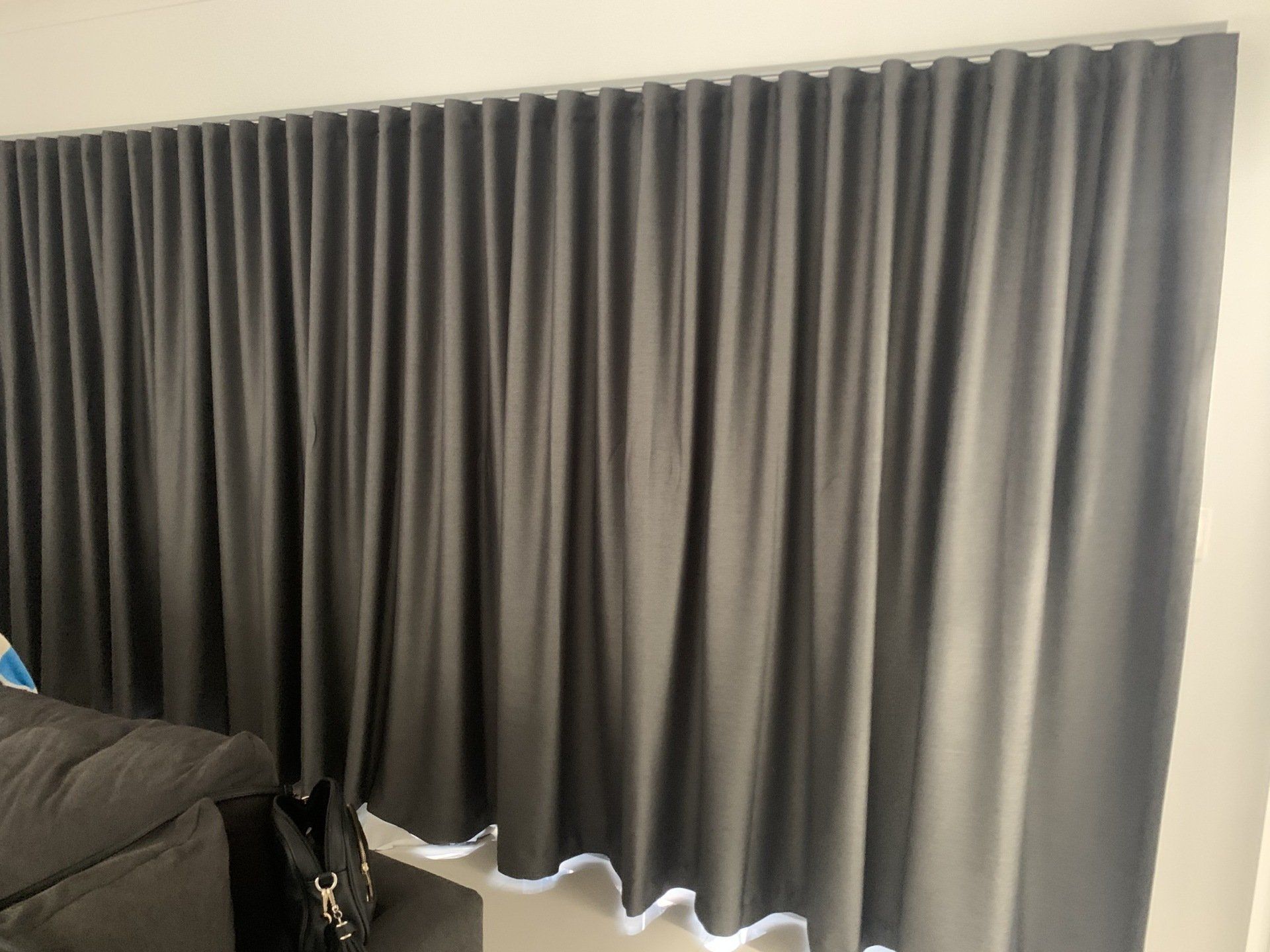 Closed Black Wavefold Curtains — Blinds, Curtains And Shutters In Alice Springs, NT
